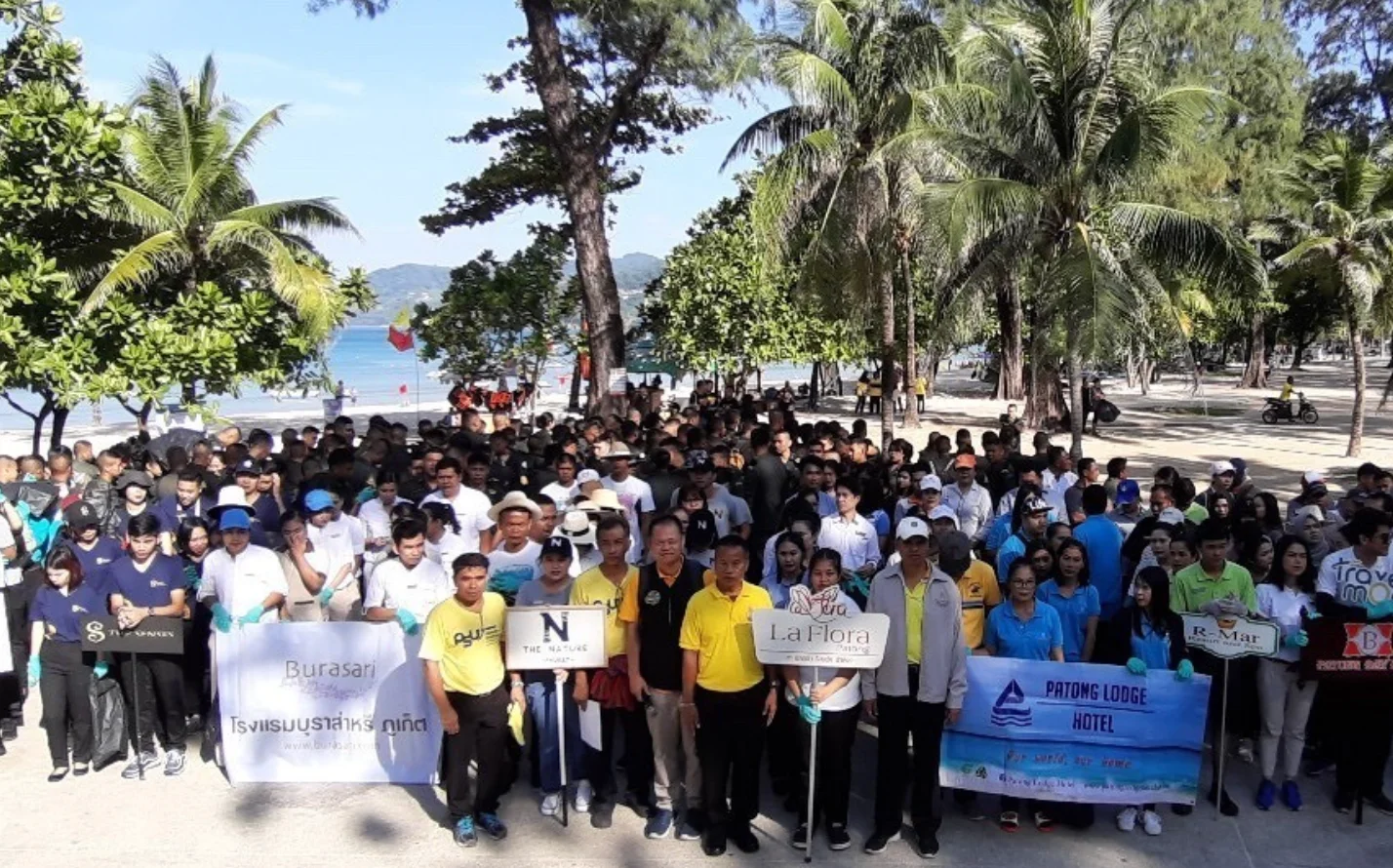 ANRCF community beach cleanup event — volunteers from Phuket hotels gather on Patong Beach